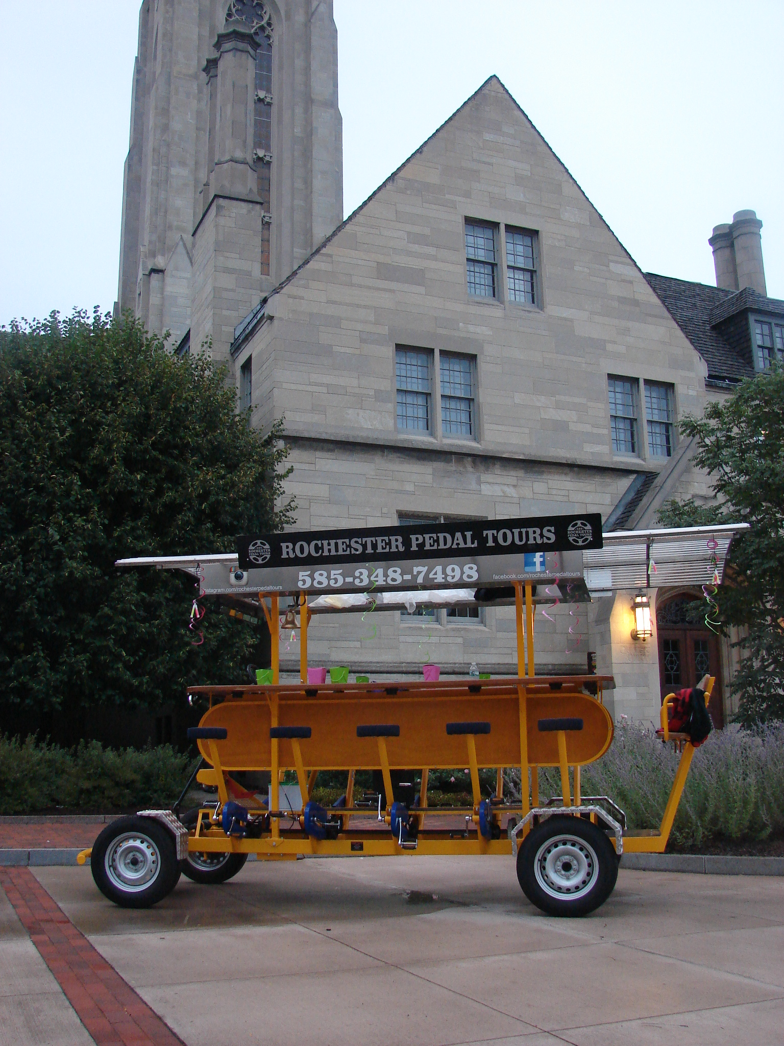 pedal pub picture in front of a cathedral
