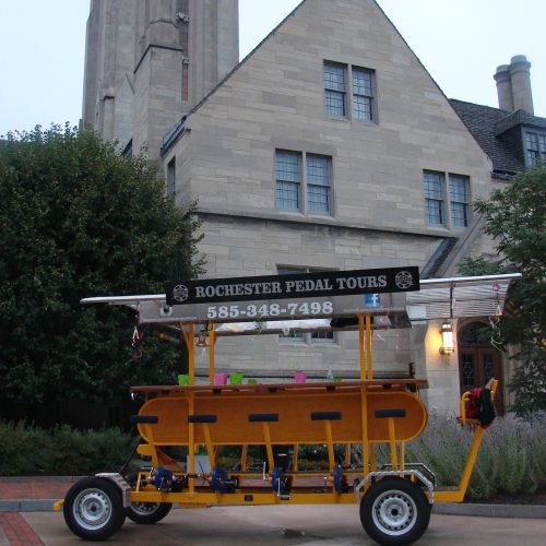 pedal pub picture in front of a cathedral